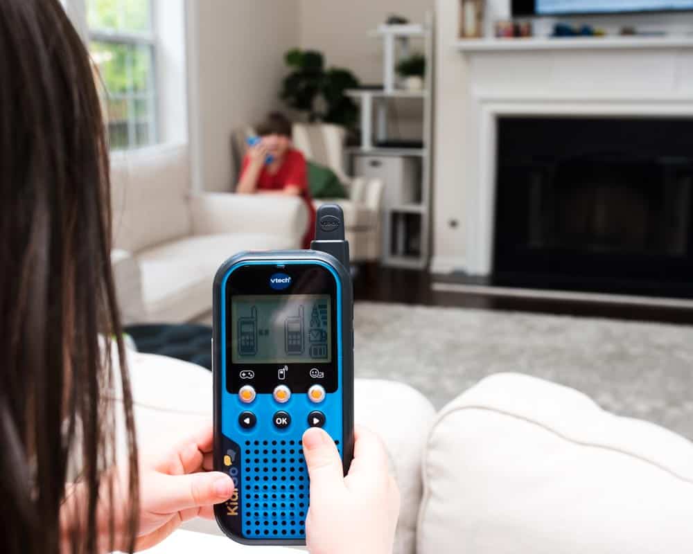 Kids playing with boredom buster KidiGo walkie talkies