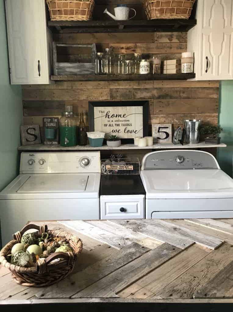 finished diy pallet wall in laundry room makeover