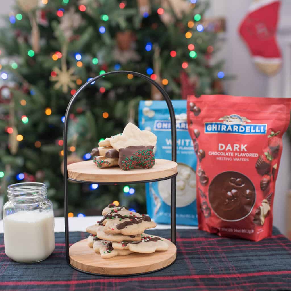 cookies and milk in front of tree